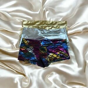 Three Shimmering mini shorts.